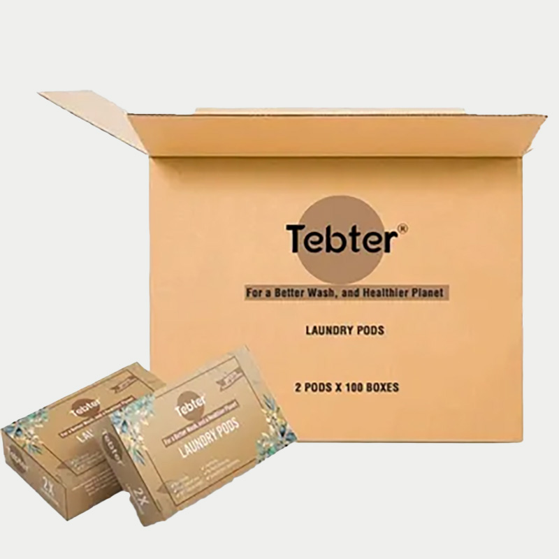 Tebter eco-friendly laundry pods with their product box displayed outside a larger shipping box for multiple orders.